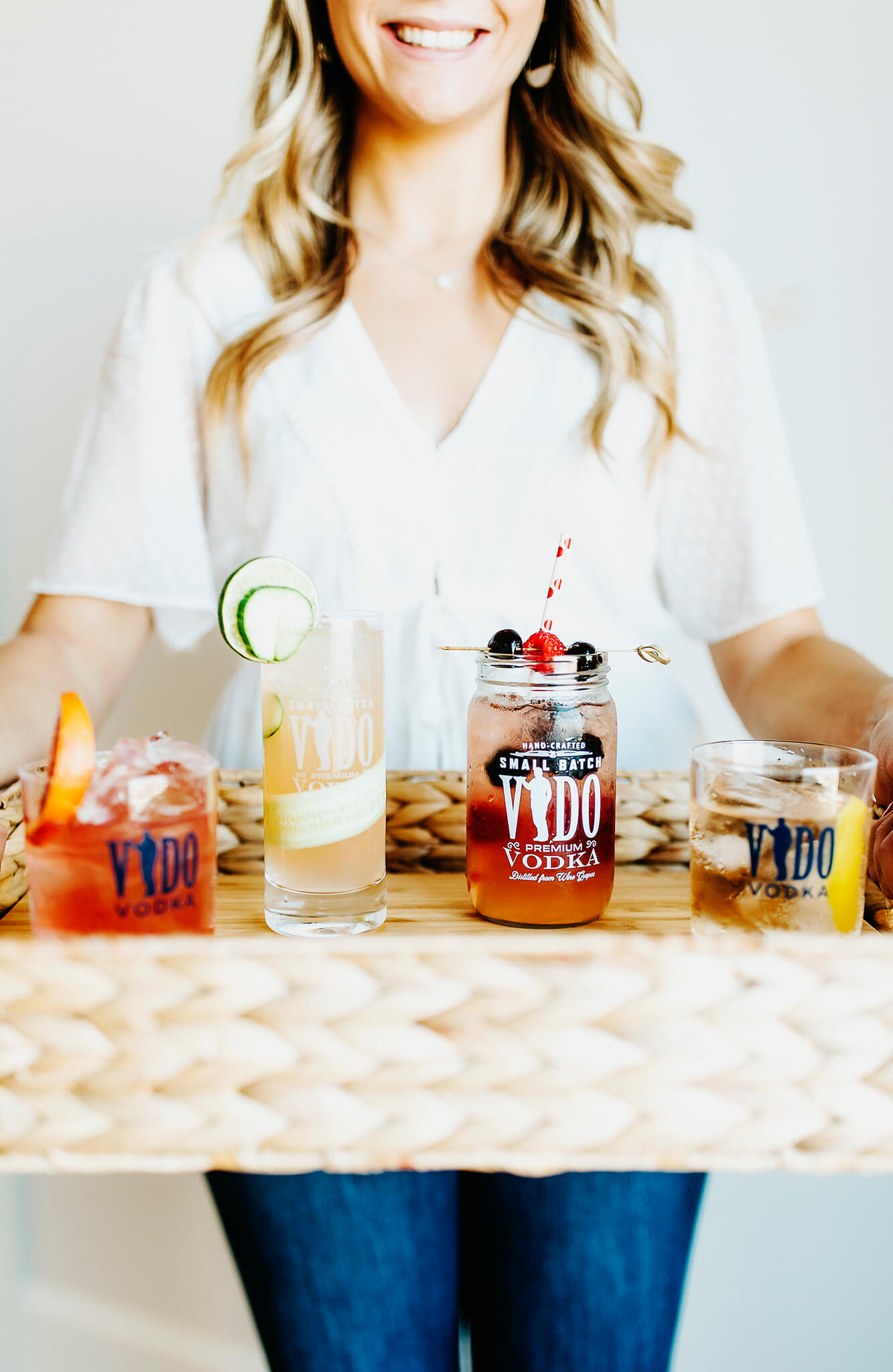 lady holding drinks